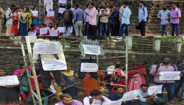സമരം നടത്തിയത് നിയമനങ്ങളുടെ മെല്ലെപ്പോക്കിനും ഉദ്യോഗസ്ഥ പുനർവിന്യാസത്തിലൂടെയുള്ള അപ്രഖ്യാപിത നിയമന- നിരോധനത്തിനും എതിരെ; ലാസ്റ്റ് ഗ്രേഡ് റാങ്ക് ഹോൾഡേഴ്സ് അസോസിയേഷൻ കോട്ടയം കളക്റ്റ്രേറ്റിനു മുൻപിൽ സംഘടിപ്പിച്ചത് ബൊമ്മയുമായുള്ള പ്രതീകാത്മക സമരം