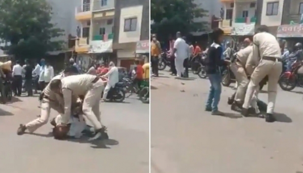 ശരിയായ രീതിയിൽ മാക്സ് ധരിച്ചില്ല; മധ്യപ്രദേശിൽ ഓട്ടോറിക്ഷാ ഡ്രൈവറെ നടുറോഡിൽ തല്ലിച്ചതച്ച് പൊലീസ്; ദൃശ്യങ്ങൾ പ്രചരിച്ചതോടെ ഉദ്യോഗസ്ഥർക്ക് സസ്പെൻഷൻ