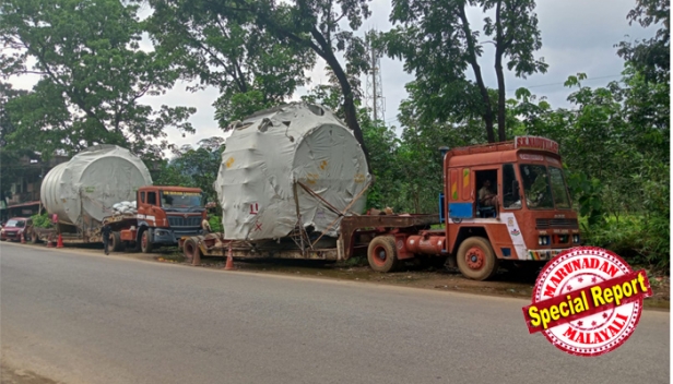 കൂറ്റൻ യന്ത്രങ്ങളുമായി താമരശ്ശേരി ചുരം കയറാനെത്തിയ ലോറികൾ റോഡിൽ കുടുങ്ങിയിട്ട് രണ്ടു മാസത്തിലധികം; അനുമതി നിഷേധിച്ചത് ഗതാഗതക്കുരുക്ക് ചൂണ്ടിക്കാട്ടി; പന്ത്രണ്ടോളം ജീവനക്കാർ പെരുവഴിയിൽ ദുരിതം പേറുന്നു; ചുരം കയറാൻ പത്ത് ലക്ഷം രൂപ വീതം കരുതൽ തുകയായി കെട്ടിവെയ്ക്കാൻ നിർദ്ദേശം